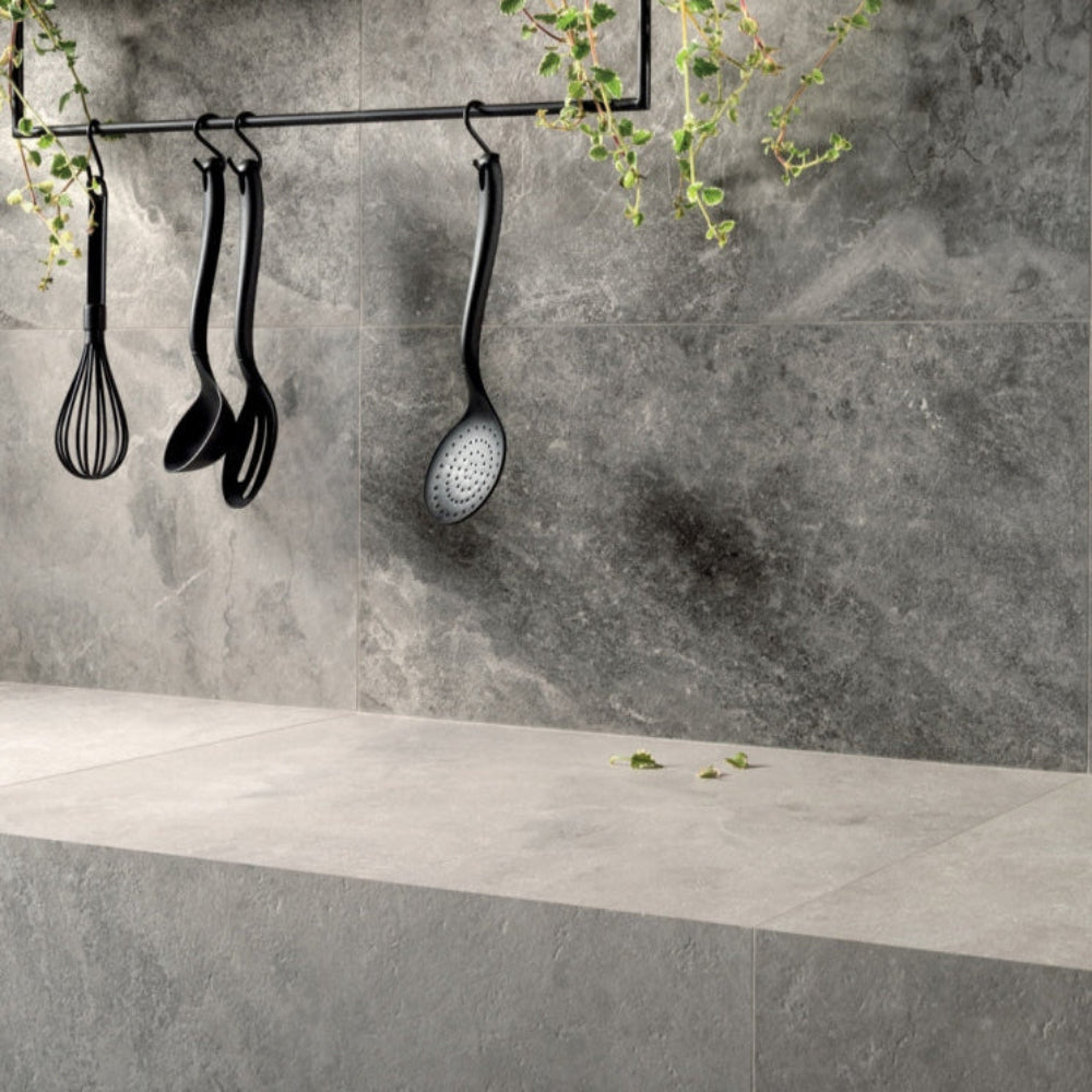 A kitchen setting featuring  Gardenia Orchedia Origini Crux White porcelain tiles on the  countertop.