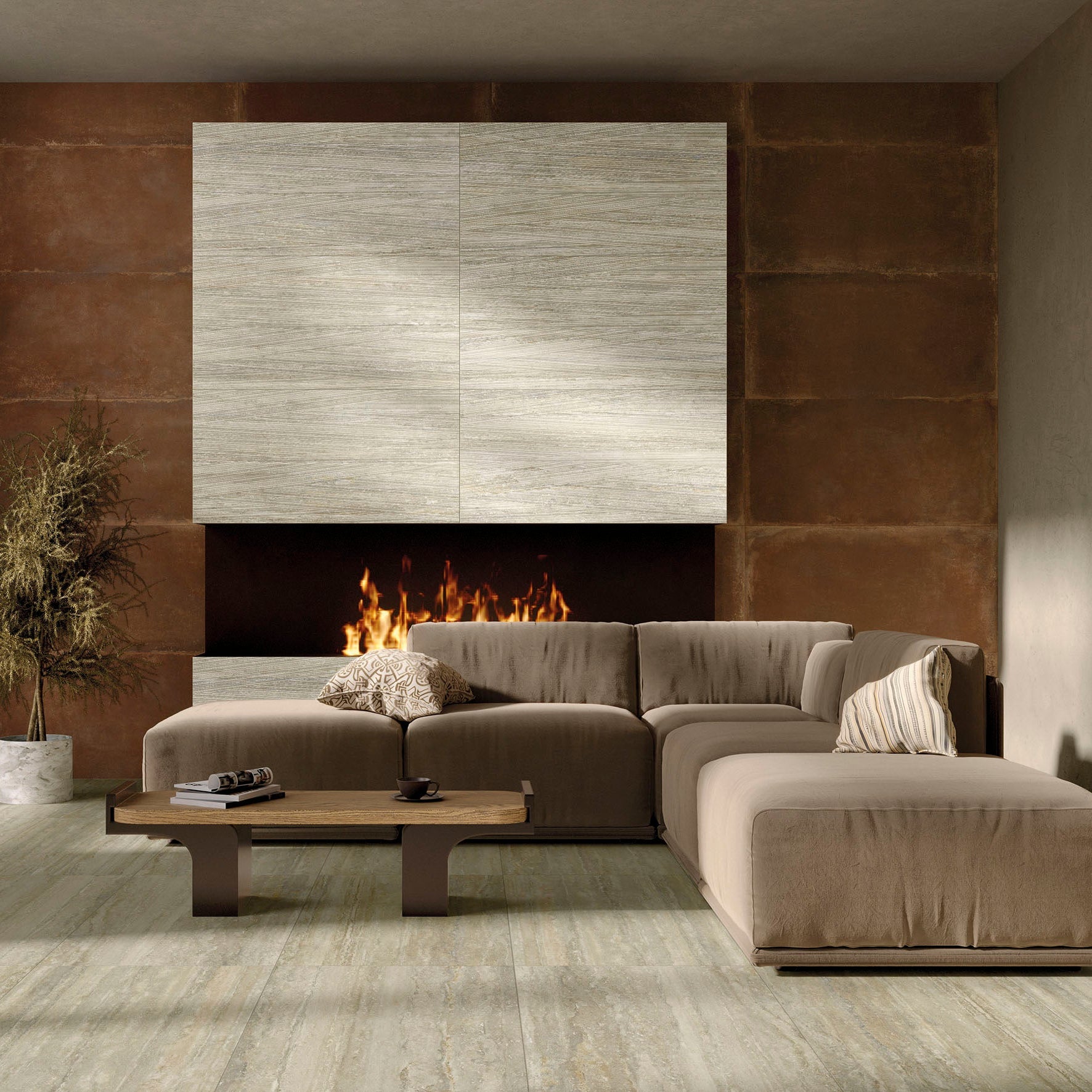 Modern living room with MGM ceramiche travertino vein cut nocciola floor, sectional sofa, and MGM Ceramiche Travertino Avorio wqll.