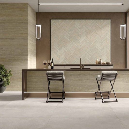 Modern kitchen with MGM ceramiche Nocciola wall on the side, bar stools, and a window view.
