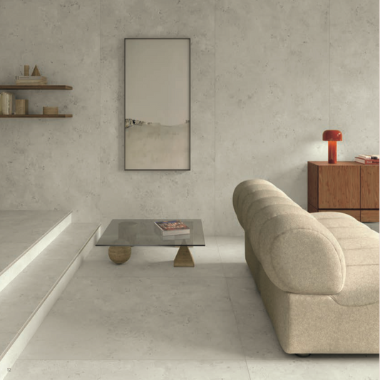 Modern living room with a Gardenia Orchedia La Geoteca Bourgogne Silver wall and floor tiles.