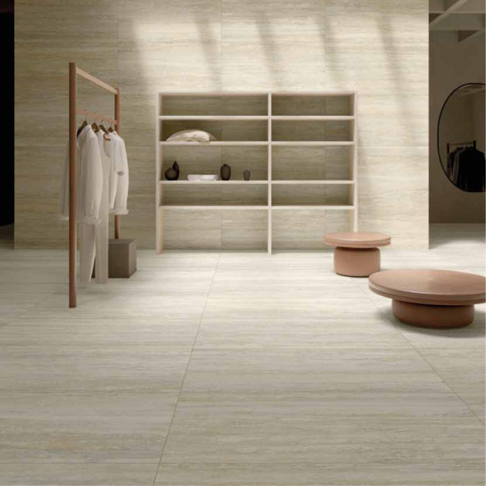 Modern interior with a coat rack, shelves, and MGM Ceramiche travertino bianco flooring.