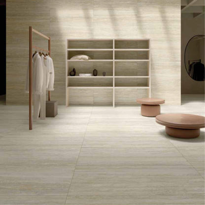 Modern interior with a coat rack, shelves, and MGM Ceramiche travertino bianco flooring.
