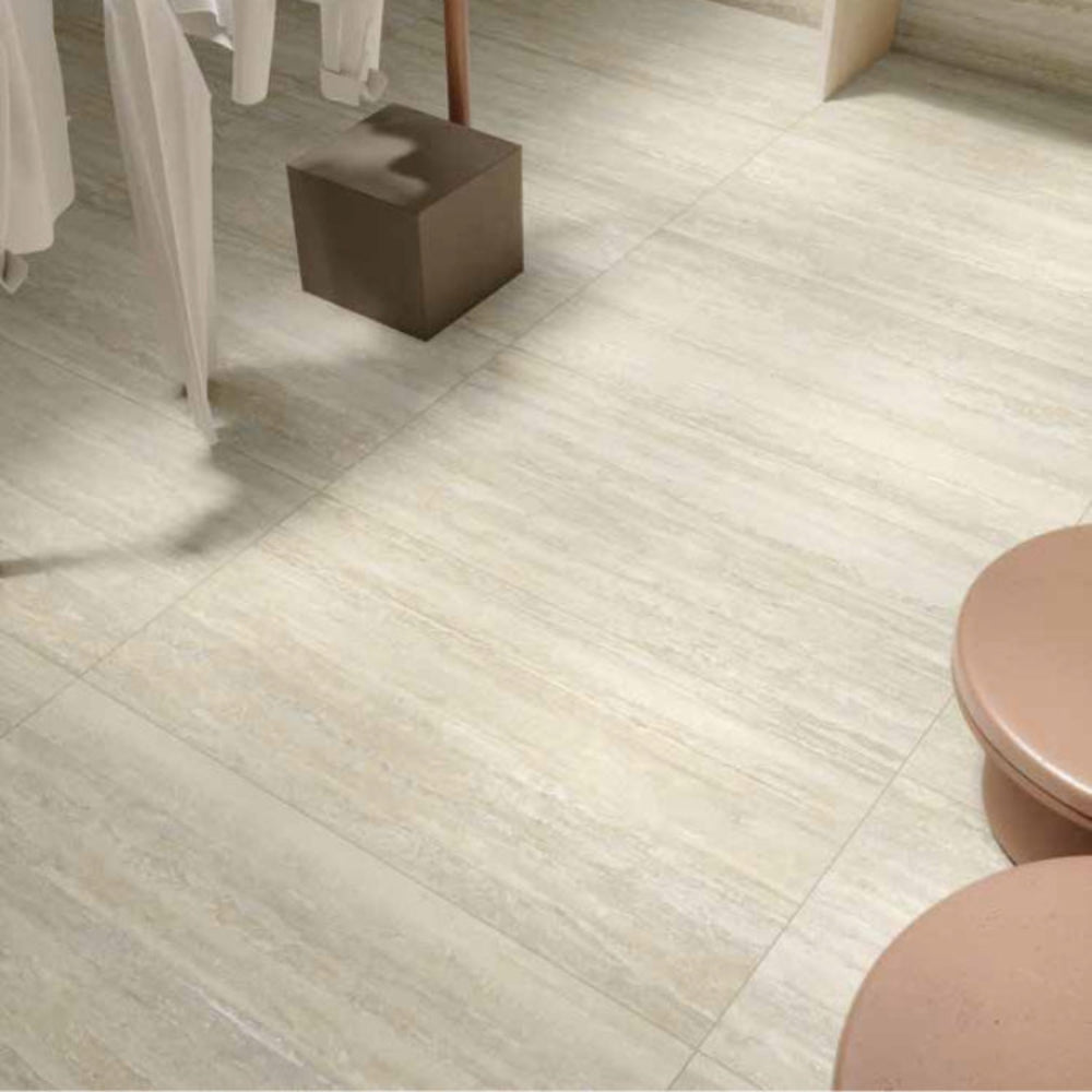 MGM Ceramiche Travertino Bianco Vein Cut Tile floor with a close up view. 